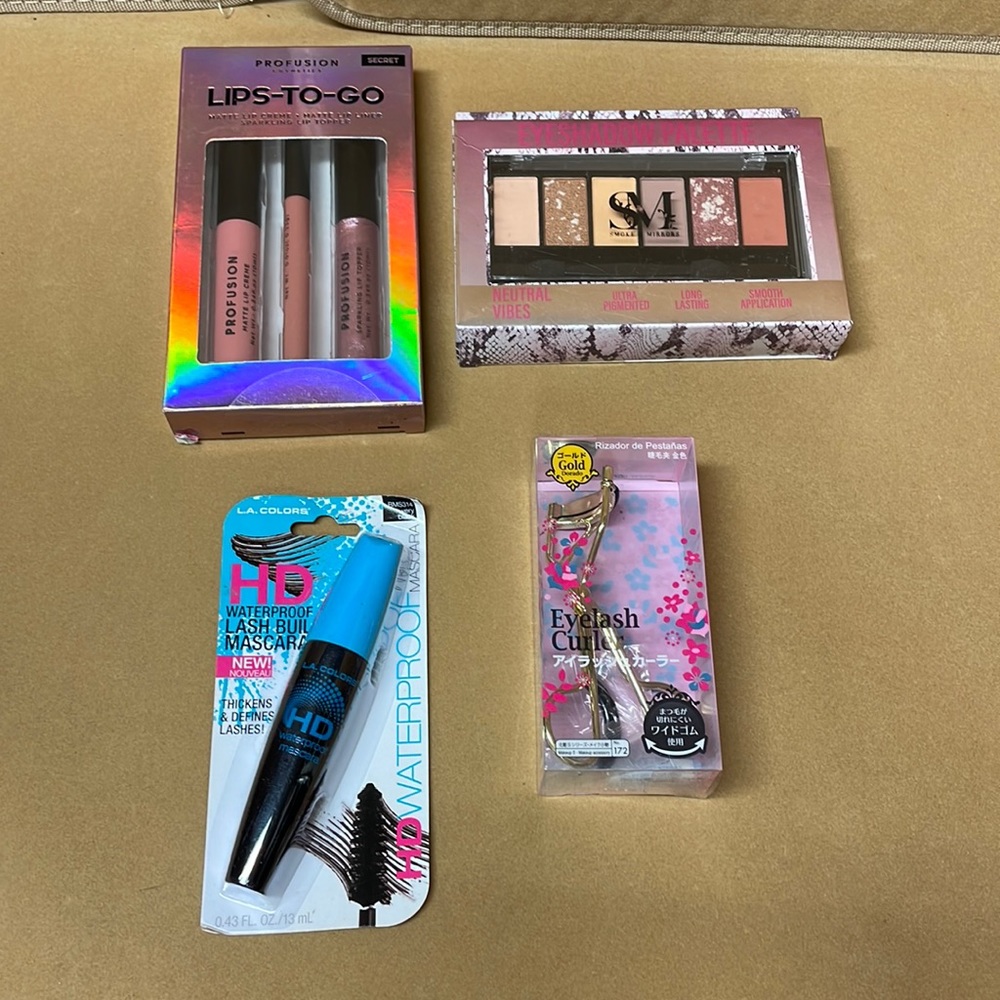 Make up bundle shadow palette, lips to go, waterproof mascara, eyelash curler